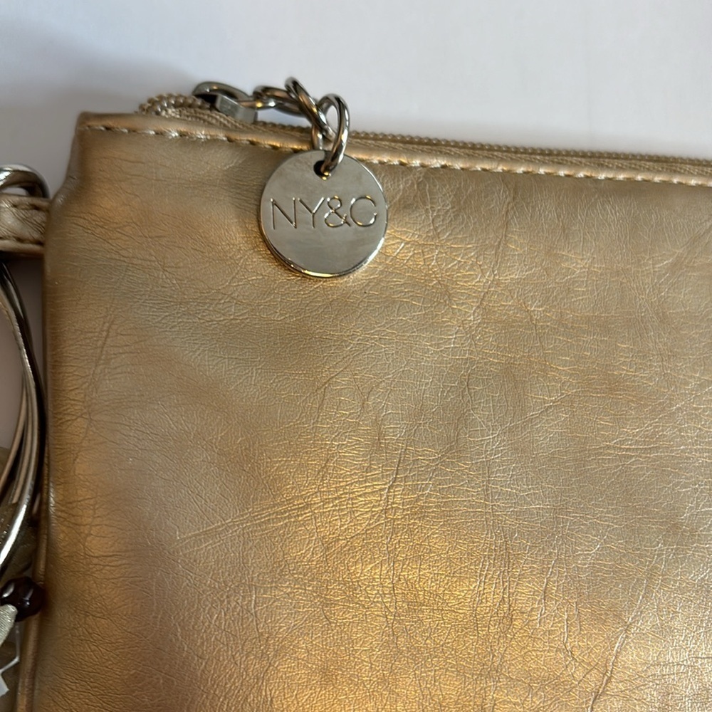 NY&CO GOLD WRISTLET WITH 3 RINGS AS WRISTLET HAS RIBBON DEATTACHABLE ADORNMENT - Picture 2 of 6